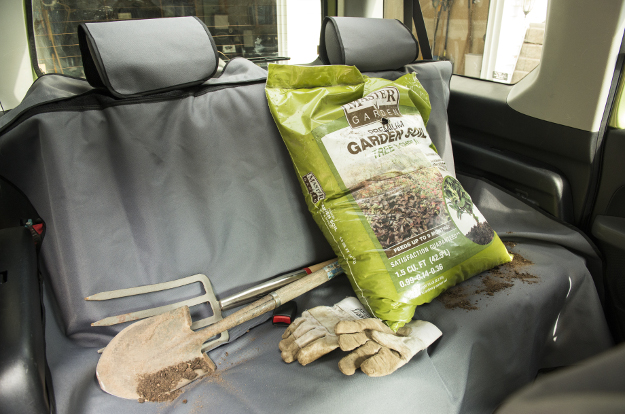CURT Seat Defender™ bench seat cover with dirty tools CURT Seat Defender™ bench seat cover with dirty tools