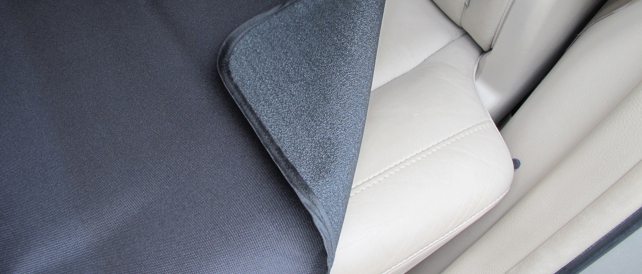 CURT Seat Defender™ temporary seat cover with dual-layer protection CURT Seat Defender™ temporary seat cover with dual-layer protection