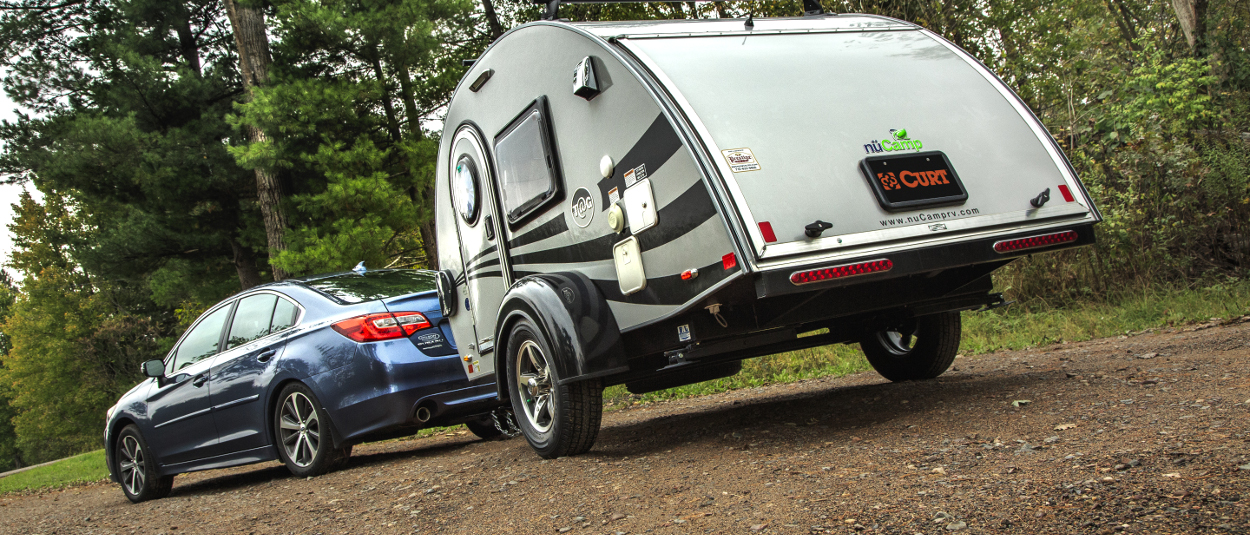 Car with class 1 hitch from CURT towing teardrop camper Car with class 1 hitch from CURT towing teardrop camper