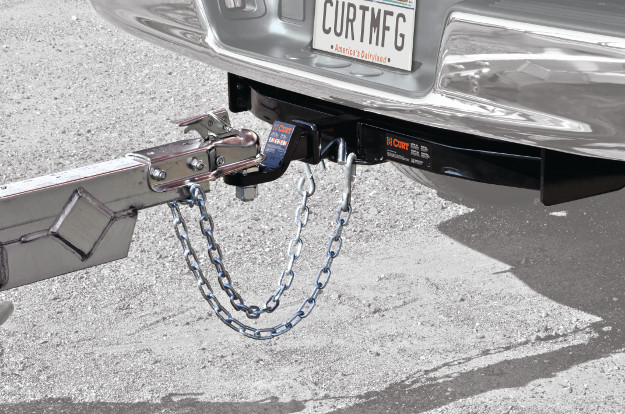 CURT class 3 hitch with ball mount coupled to trailer CURT class 3 hitch with ball mount coupled to trailer