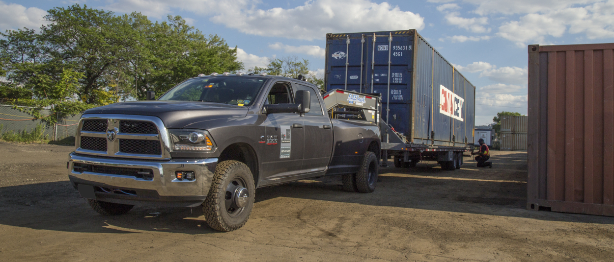 CURT gooseneck hitch on truck towing flatbed trailer CURT gooseneck hitch on truck towing flatbed trailer