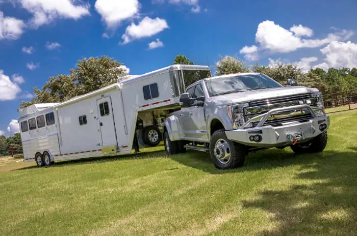 Farm Truck Towing Large Livestock Trailer Farm Truck Towing Large Livestock Trailer
