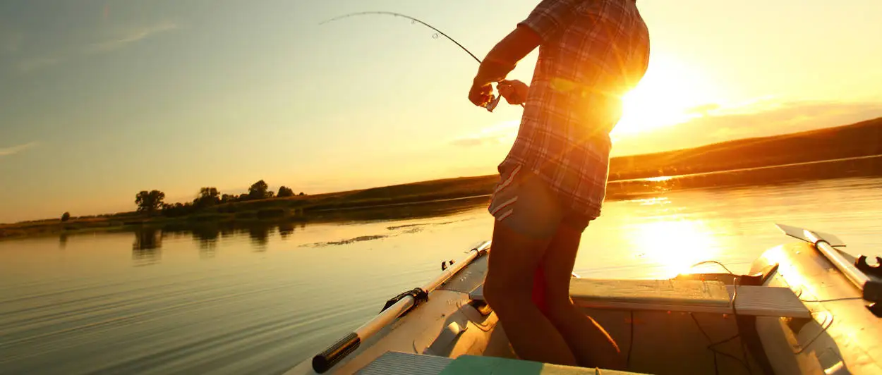 Fishing on the Lake at Sunset Fishing on the Lake at Sunset