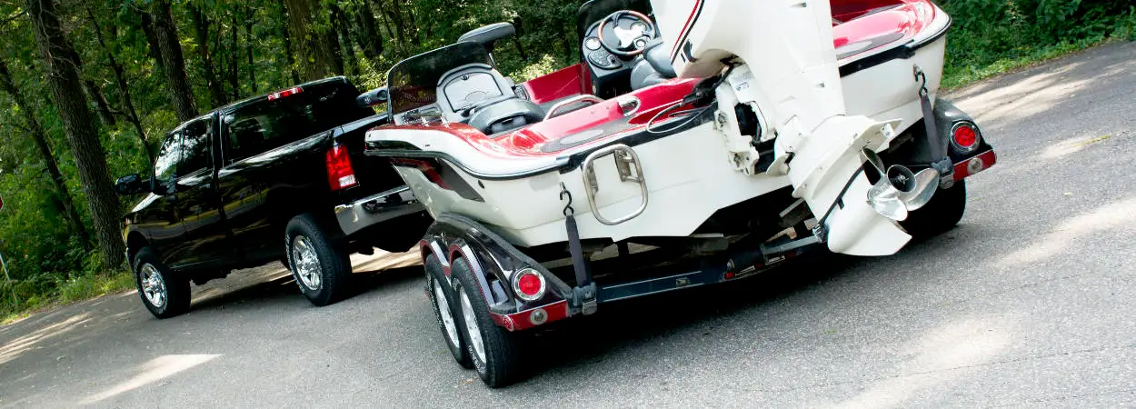 Pickup Truck Coupled to Boat Trailer Pickup Truck Coupled to Boat Trailer
