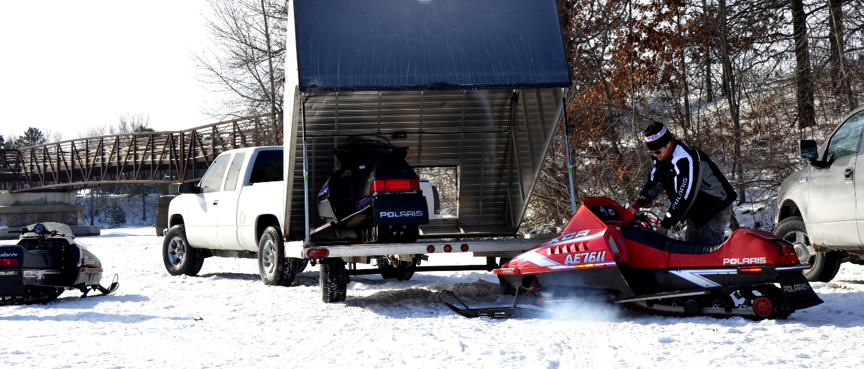 Snowmobile trailer and truck with class 3 hitch from CURT Snowmobile trailer and truck with class 3 hitch from CURT