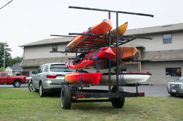 SUV Towing Kayak Trailer Parking Lot SUV Towing Kayak Trailer Parking Lot