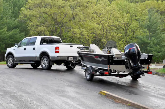 Truck Pulling Trailer with Fishing Boat Truck Pulling Trailer with Fishing Boat