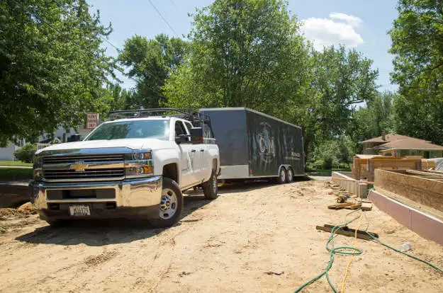 Work Truck Towing Enclosed Utility Trailer Work Truck Towing Enclosed Utility Trailer